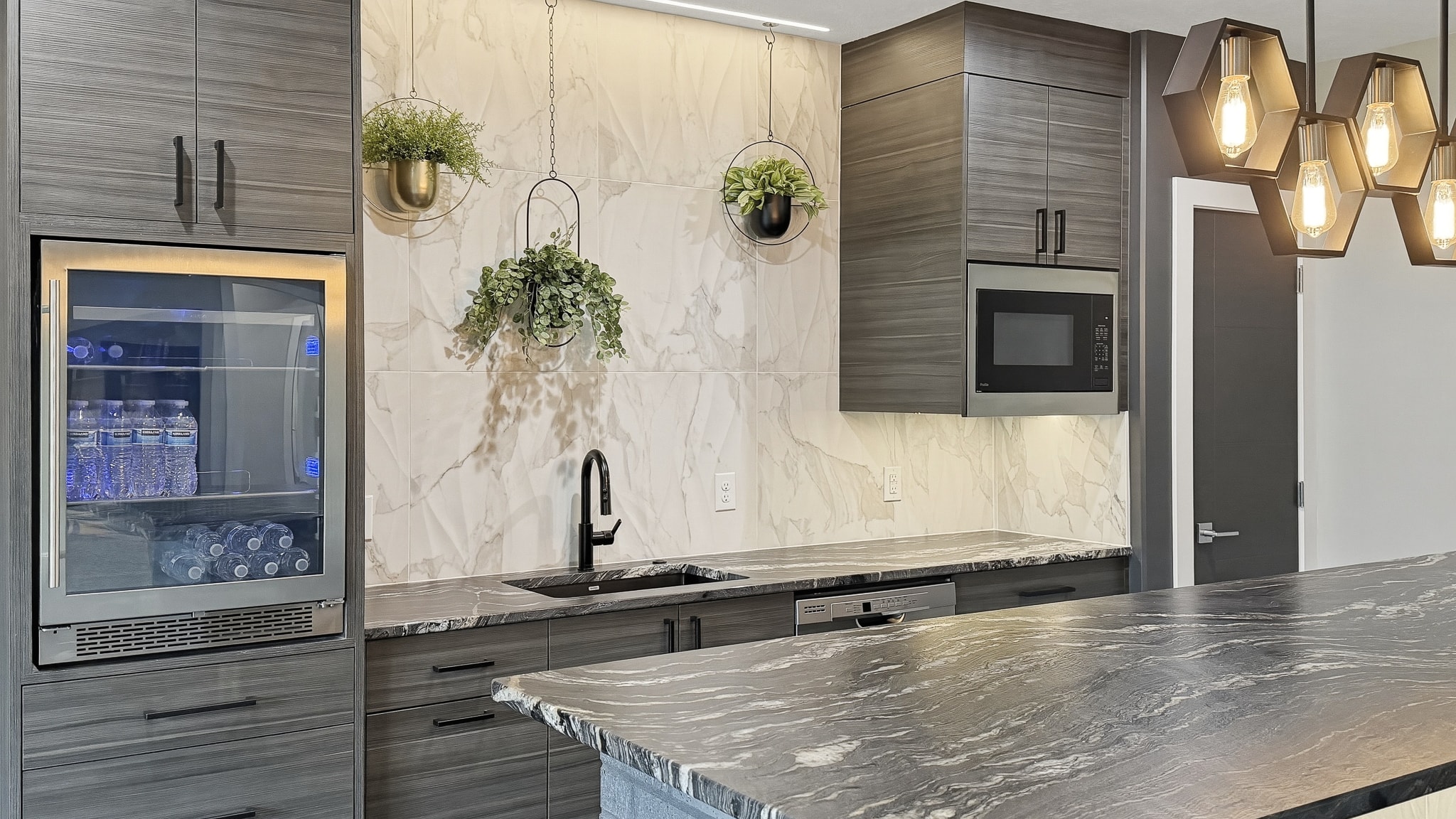 Bar with beverage fridge, marble tile backsplash, dark cabinetry and dark tile floor